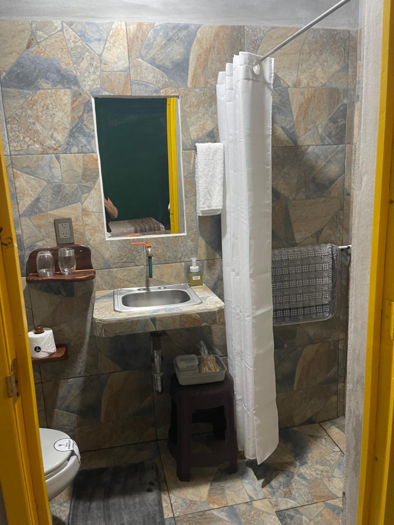 Отель Casa Conicarit Пуэрто-Эскондидо Экстерьер фото